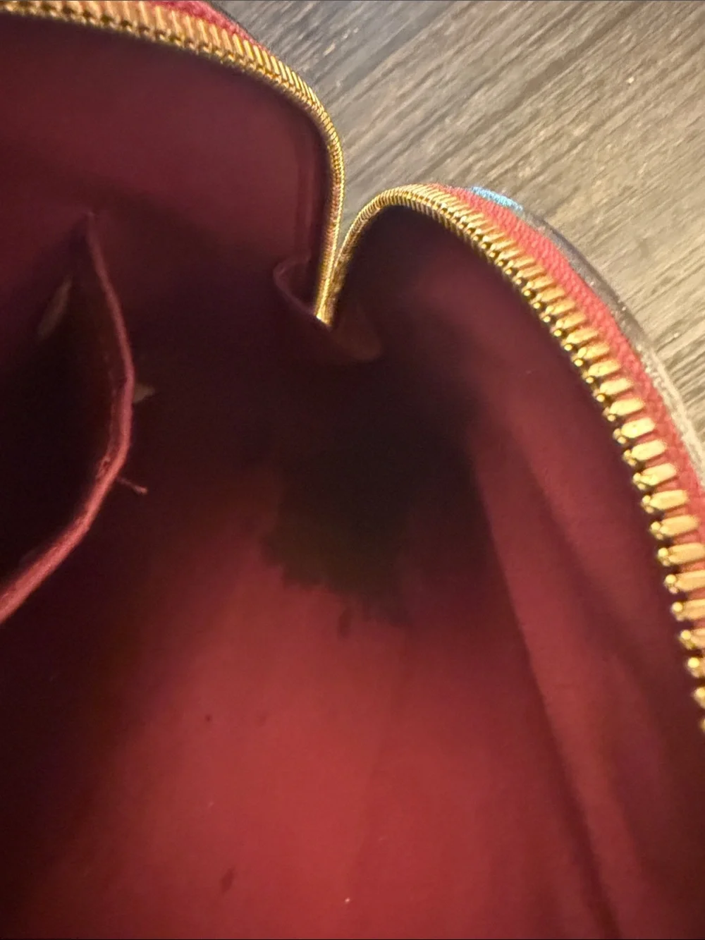 Louis Vuitton Burgundy Leather purse with Gold Hardware